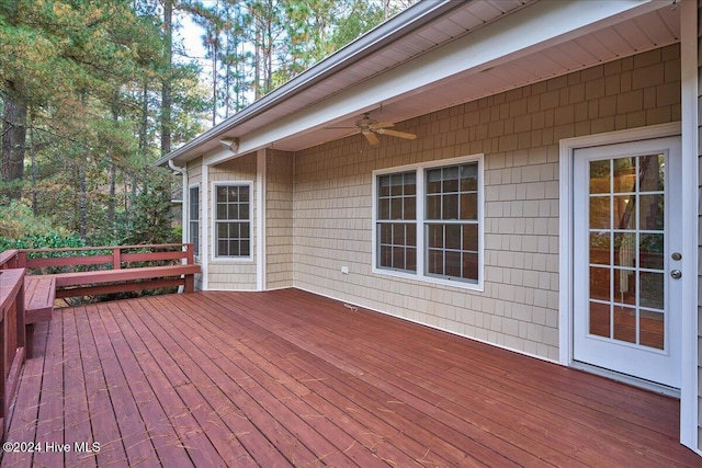 wooden deck with ceiling fan