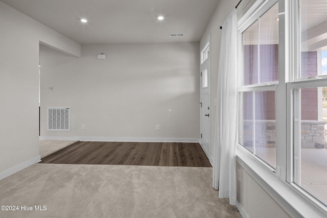 empty room featuring hardwood / wood-style floors