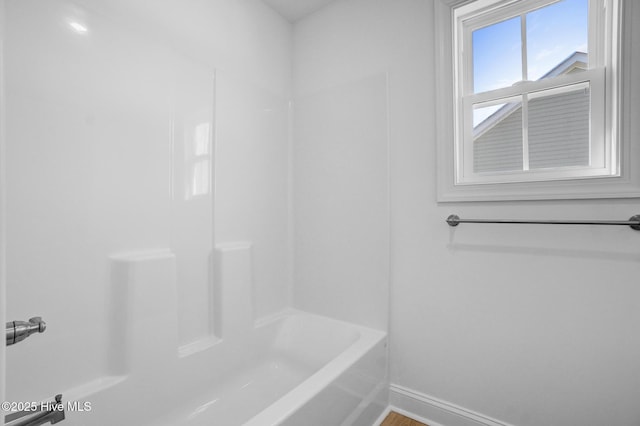 bathroom with shower / bath combination