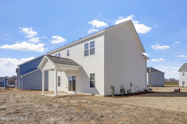 rear view of house featuring a patio