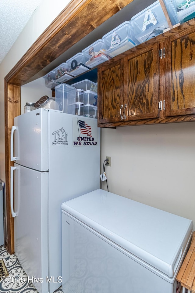 103 Shamrock Rd, Goldsboro, NC 27530 - laundry room featuring cabinet space