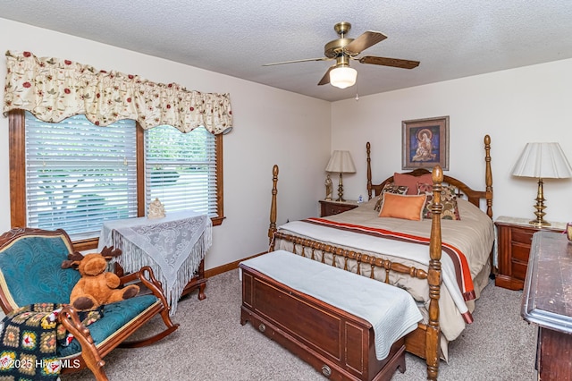 103 Shamrock Rd, Goldsboro, NC 27530 - carpeted bedroom featuring a textured ceiling, a ceiling fan, and baseboards