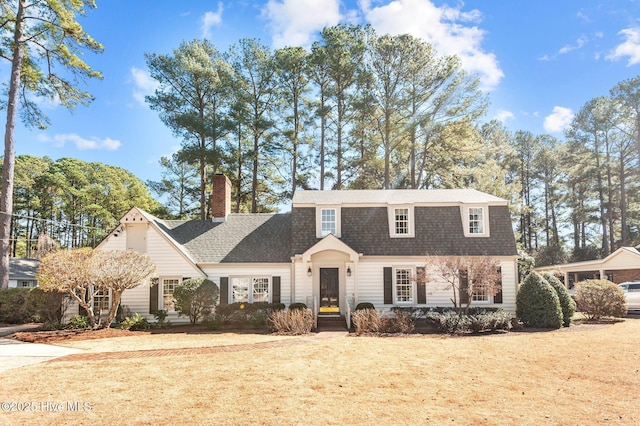 view of front of home with a front yard