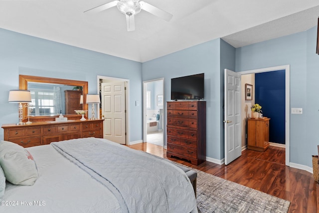 bedroom with ceiling fan and dark hardwood / wood-style flooring