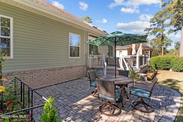 view of patio with a deck