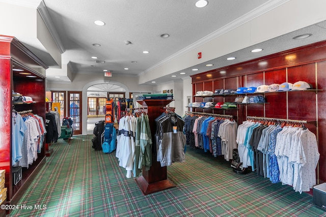 walk in closet with carpet