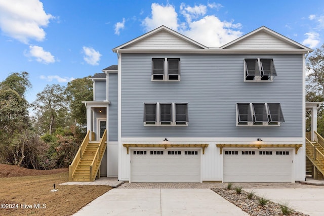 front of property with a garage