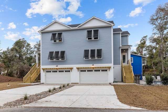 front of property featuring a garage