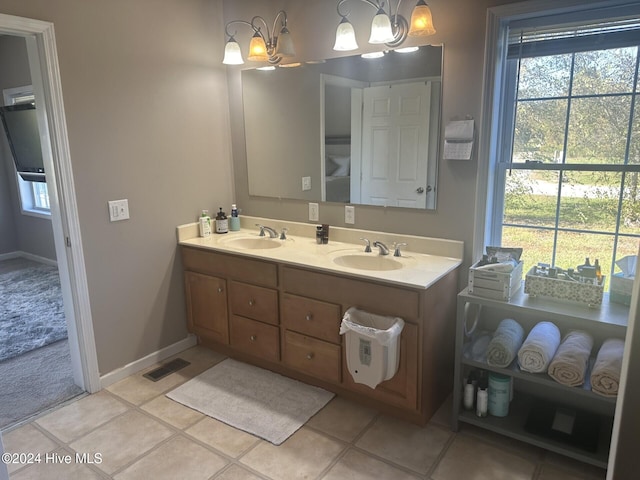 bathroom with vanity and tile patterned floors