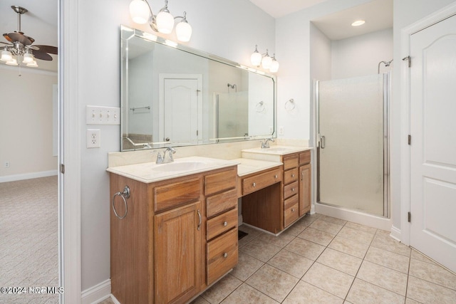 bathroom with walk in shower, tile patterned flooring, vanity, and ceiling fan