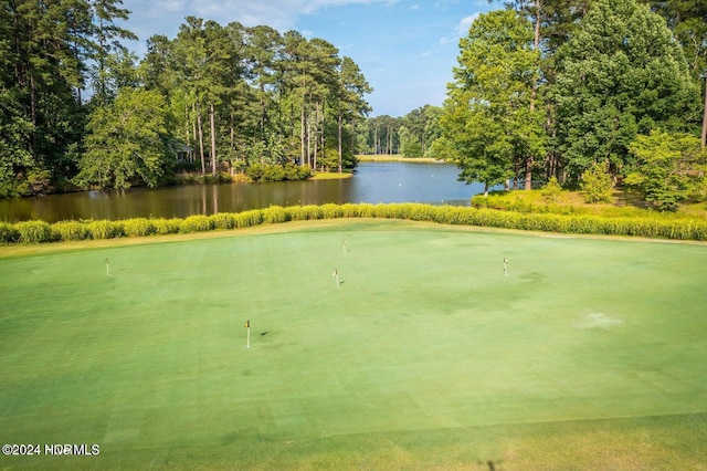 surrounding community with a water view