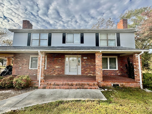 front of property featuring a porch