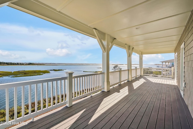 deck featuring a water view