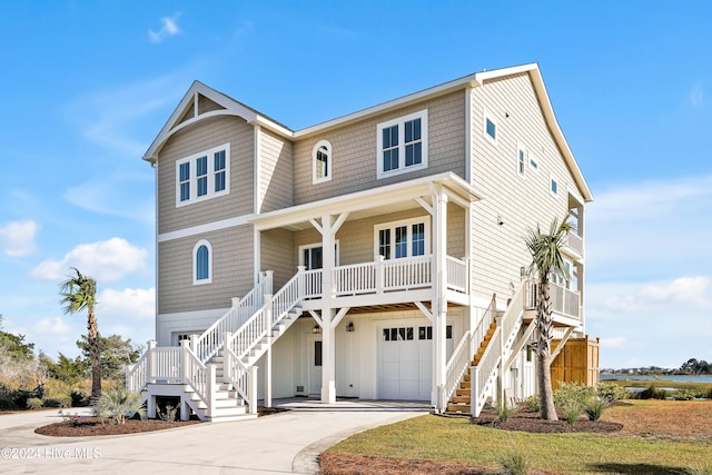 view of front of house with a garage and covered porch