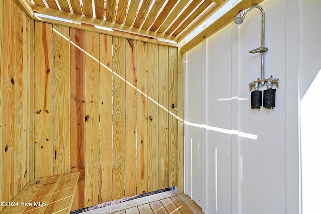 interior space featuring wood walls