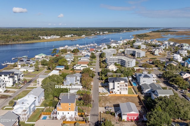 drone / aerial view with a water view