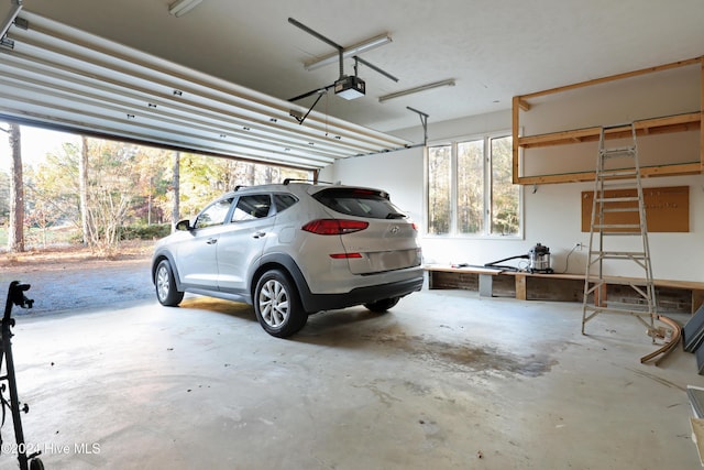 garage featuring a garage door opener