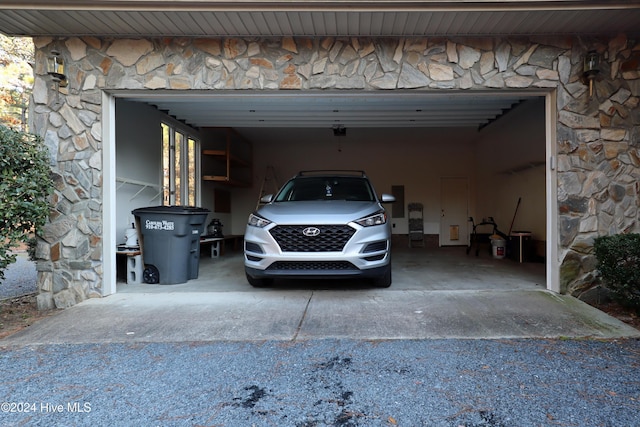 garage featuring a garage door opener