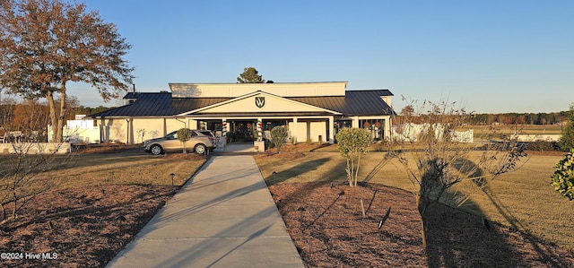 view of front of house with a carport