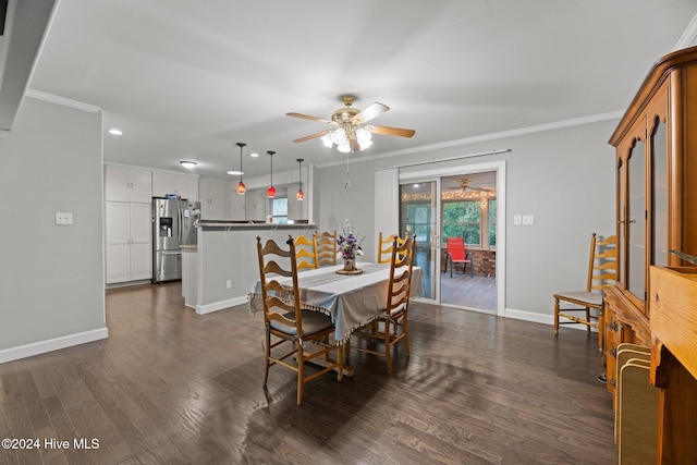 dining space featuring dark hardwood / wood-style flooring, ceiling fan, and crown molding