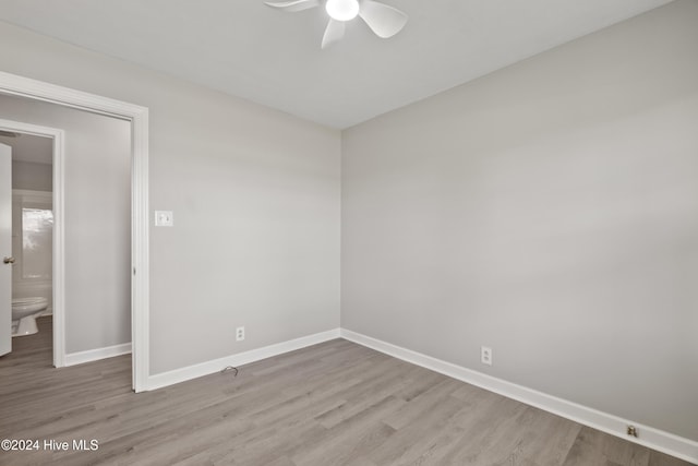 empty room featuring light hardwood / wood-style floors and ceiling fan