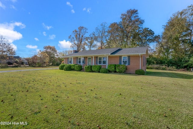 ranch-style house with a front yard