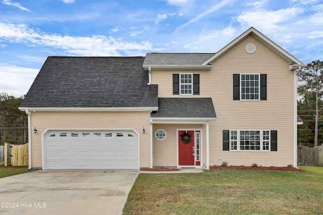 view of property featuring a front yard