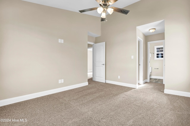 unfurnished bedroom featuring carpet floors and ceiling fan