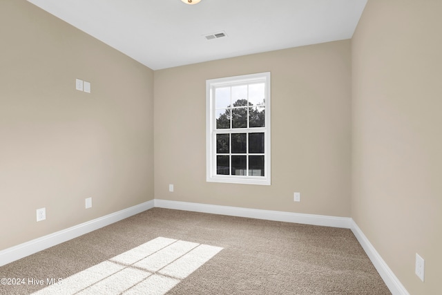 view of carpeted spare room