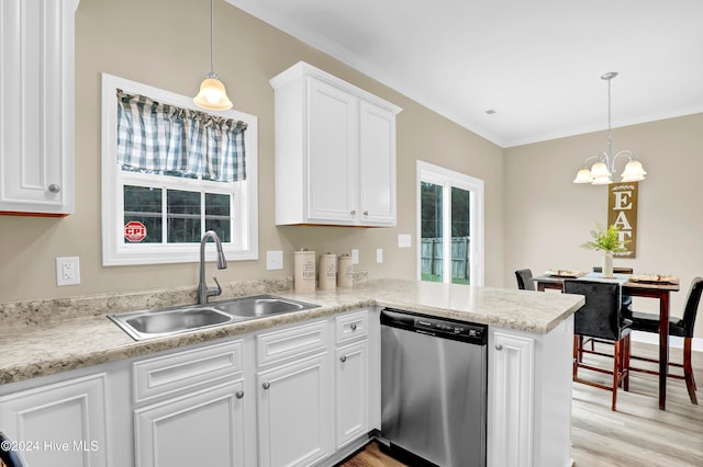 kitchen featuring sink, kitchen peninsula, stainless steel dishwasher, hanging light fixtures, and light hardwood / wood-style flooring