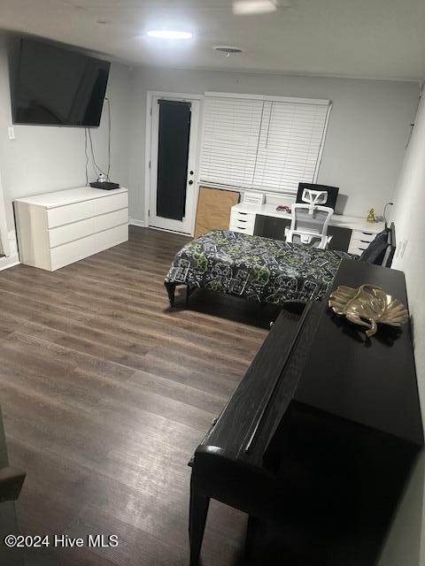 bedroom featuring dark hardwood / wood-style floors