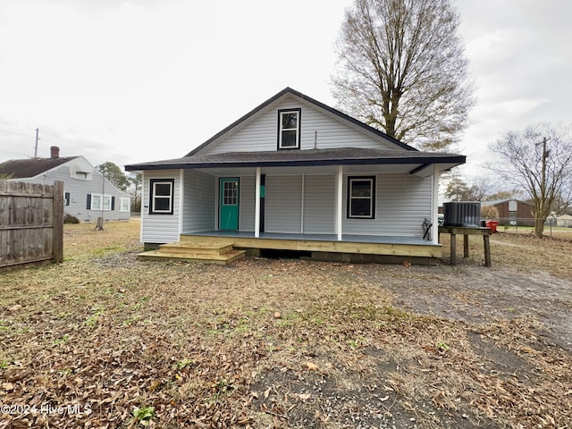 view of front of house with central AC unit and a porch