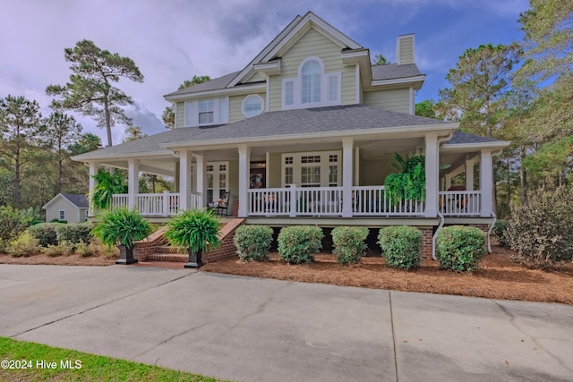 farmhouse-style home featuring a porch