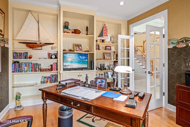 office space with hardwood / wood-style floors and crown molding