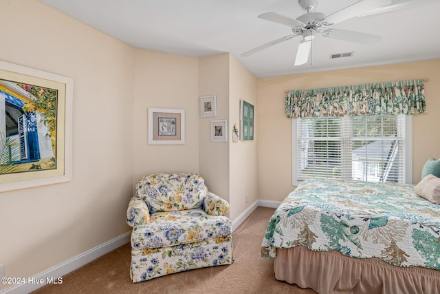 bedroom with ceiling fan and carpet flooring