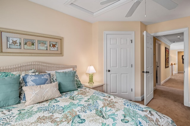 carpeted bedroom with ceiling fan