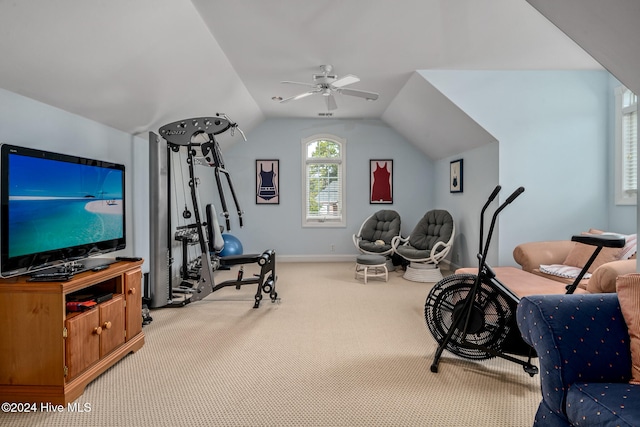 workout area with carpet flooring, ceiling fan, and vaulted ceiling