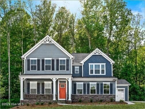 craftsman inspired home featuring a garage