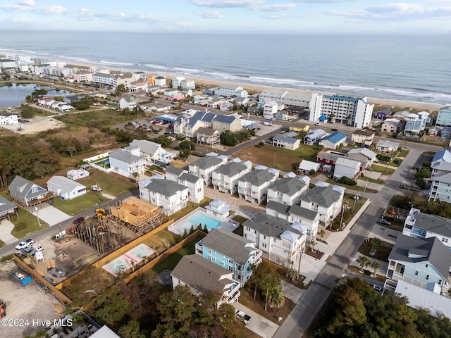 bird's eye view with a residential view and a water view