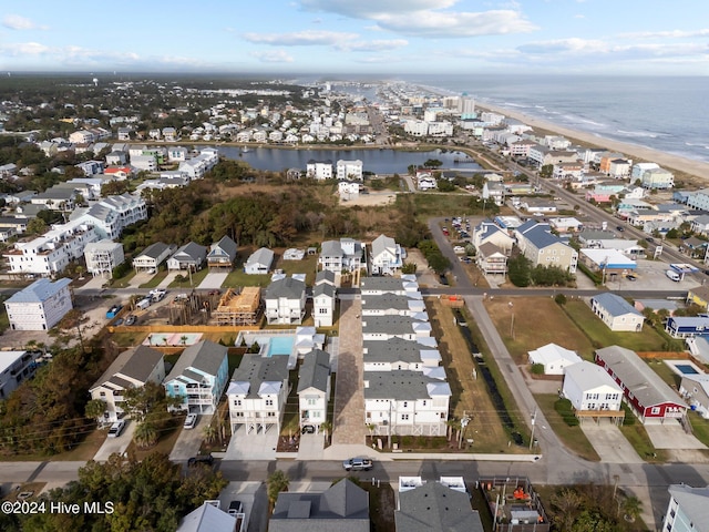 bird's eye view with a water view and a residential view