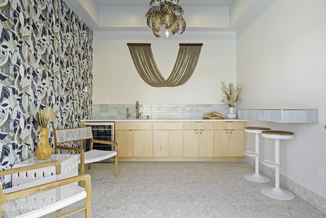 908 Second St S Unit 2, Carolina Beach, NC 28428 - bathroom with beverage cooler, backsplash, and vanity