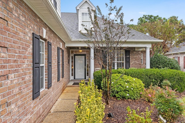 4151 Windham Ln, Southport, NC 28461 - entrance to property with a shingled roof and brick siding