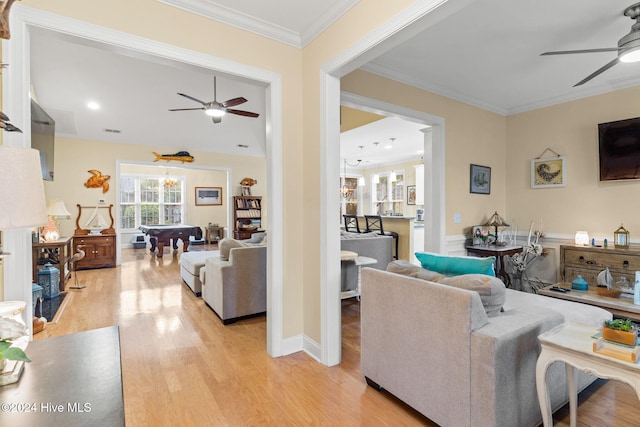4151 Windham Ln, Southport, NC 28461 - living room with a ceiling fan, light wood-style flooring, and ornamental molding