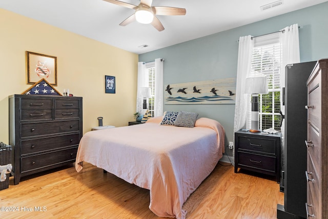 4151 Windham Ln, Southport, NC 28461 - bedroom featuring light wood finished floors and ceiling fan