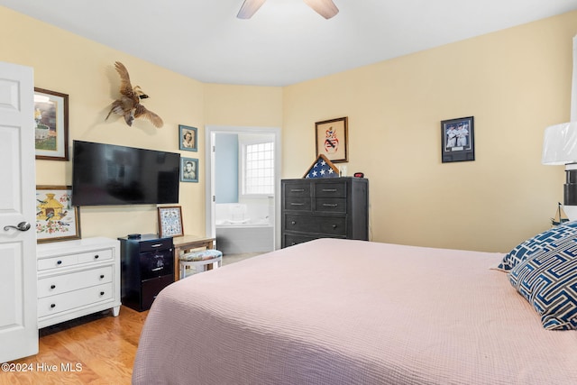 4151 Windham Ln, Southport, NC 28461 - bedroom with wood finished floors, connected bathroom, and a ceiling fan