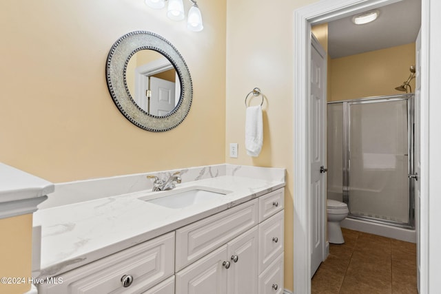 4151 Windham Ln, Southport, NC 28461 - full bath with tile patterned flooring, a shower stall, vanity, and toilet