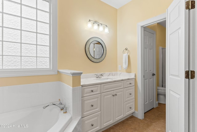 4151 Windham Ln, Southport, NC 28461 - bathroom featuring tile patterned flooring, vanity, and a garden tub