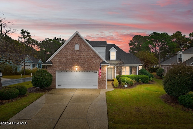 4151 Windham Ln, Southport, NC 28461 - traditional-style house with brick siding, driveway, and a yard