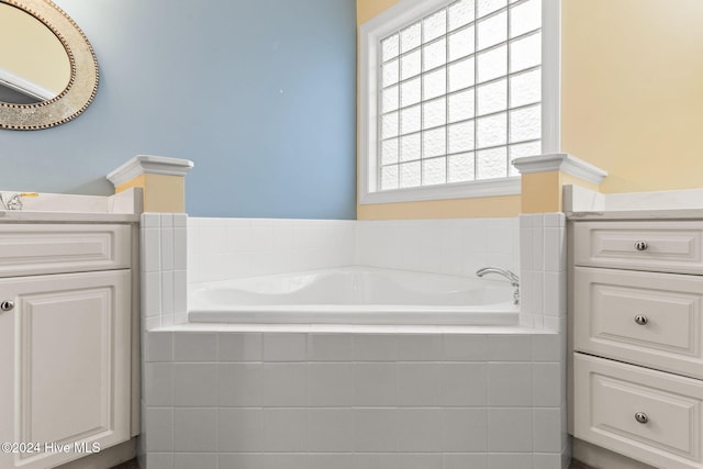 4151 Windham Ln, Southport, NC 28461 - full bathroom with vanity and a garden tub