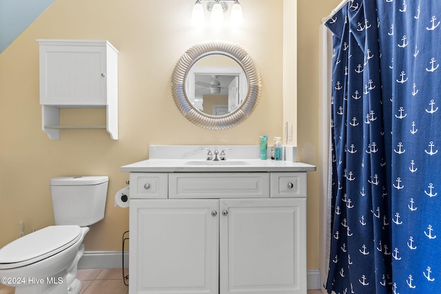 4151 Windham Ln, Southport, NC 28461 - full bath featuring tile patterned floors, toilet, baseboards, vanity, and a shower with shower curtain